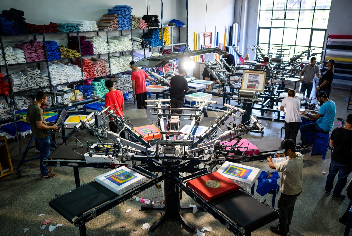 Premium screen printing and embroidery process for rush order tees